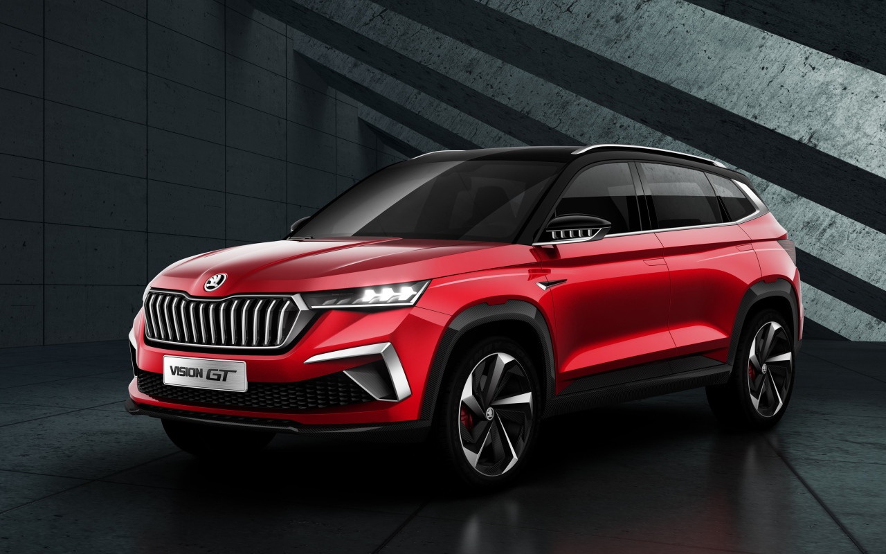 Red Skoda Vision GT 2019 SUV on a gray background