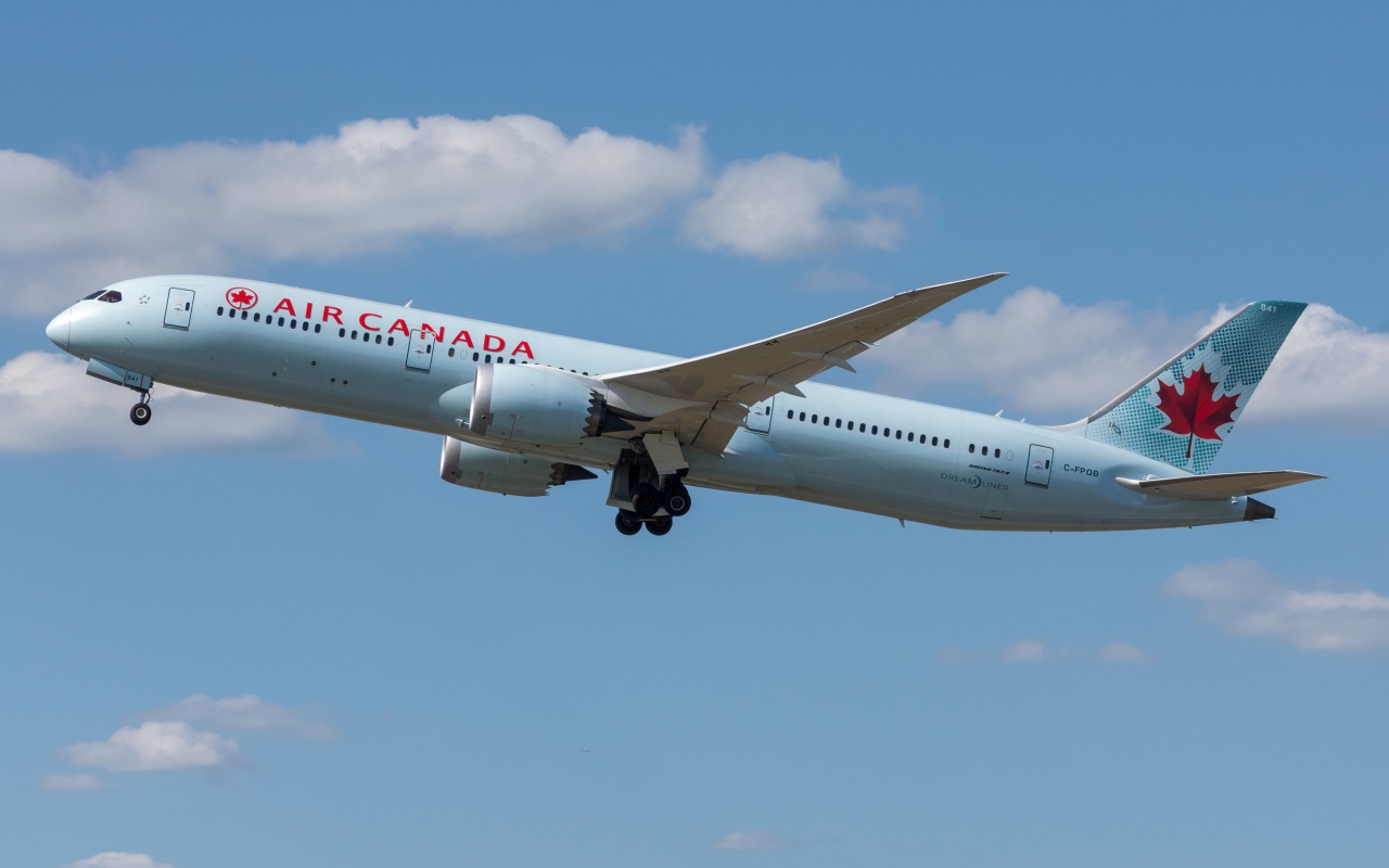 A large passenger aircraft Boeing 787-9 airline Air Canada in the sky