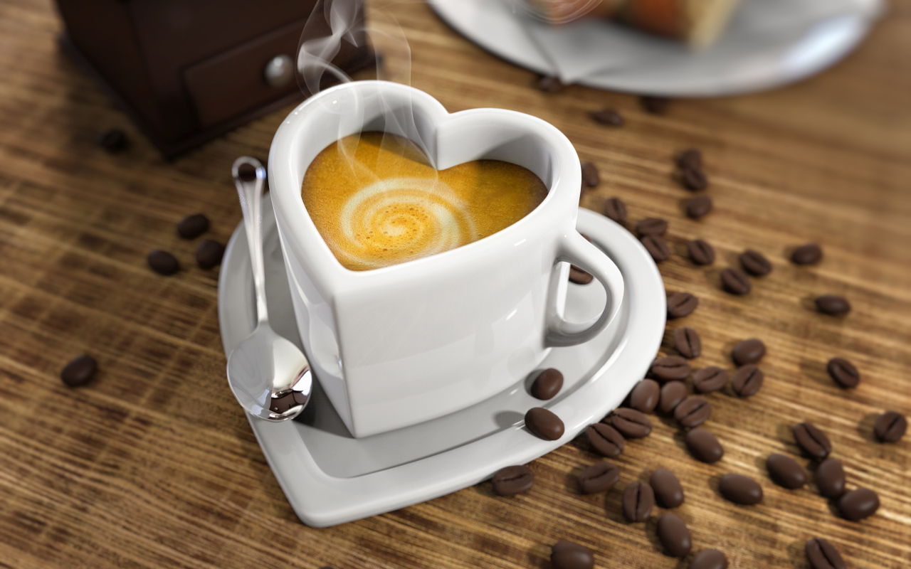 Белая красивая чашка в форме сердца на столе на зернами