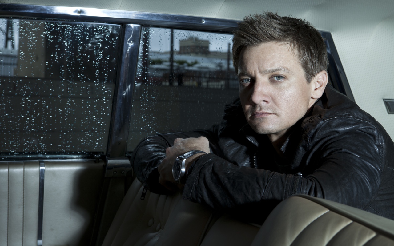 Actor Jeremy Renner is sitting in the car