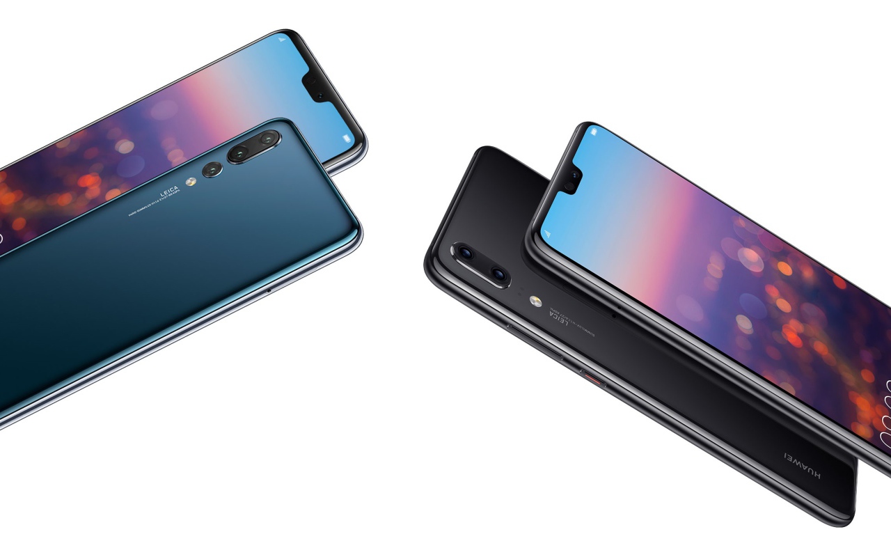 Красивые тонкие смартфоны Huawei P20 Pro на белом фоне