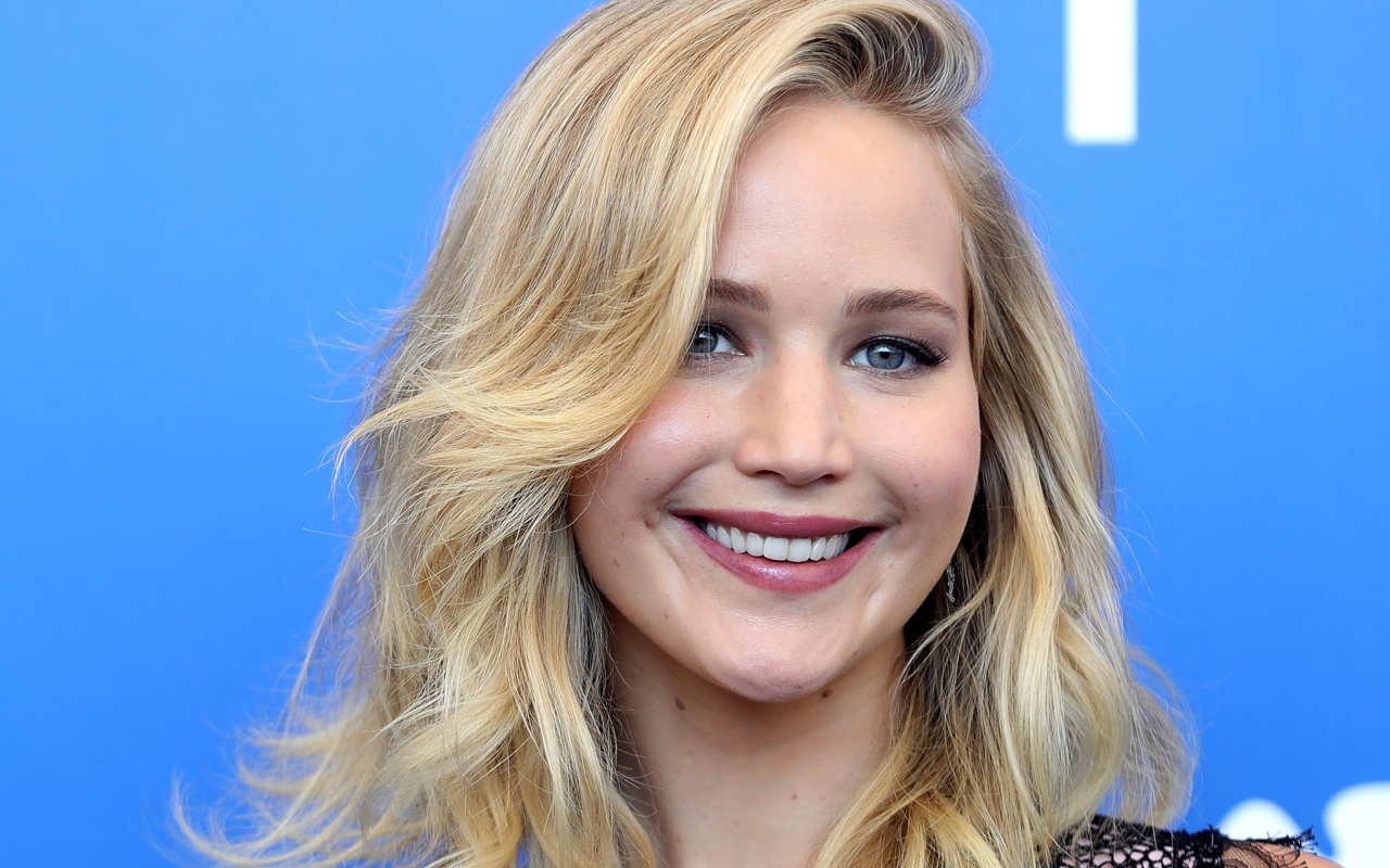 Smiling girl, actress Jennifer Lawrence's face close-up