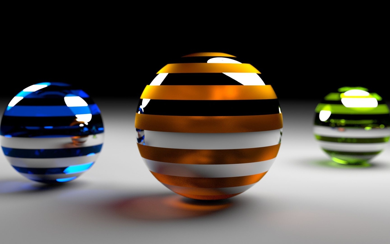 Разноцветные 3д шары на серой поверхности 