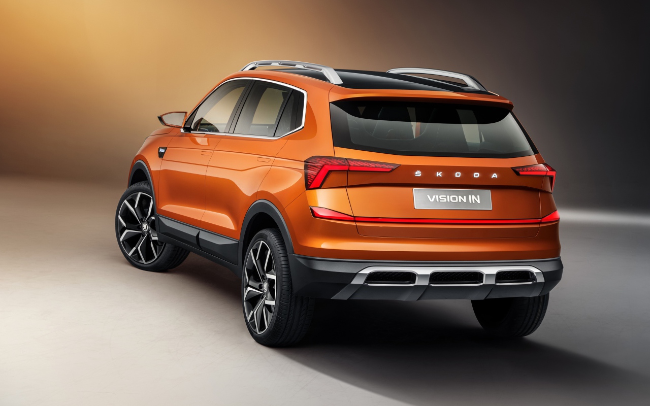 Оранжевый внедорожник Skoda Vision IN 2020 года вид сзади