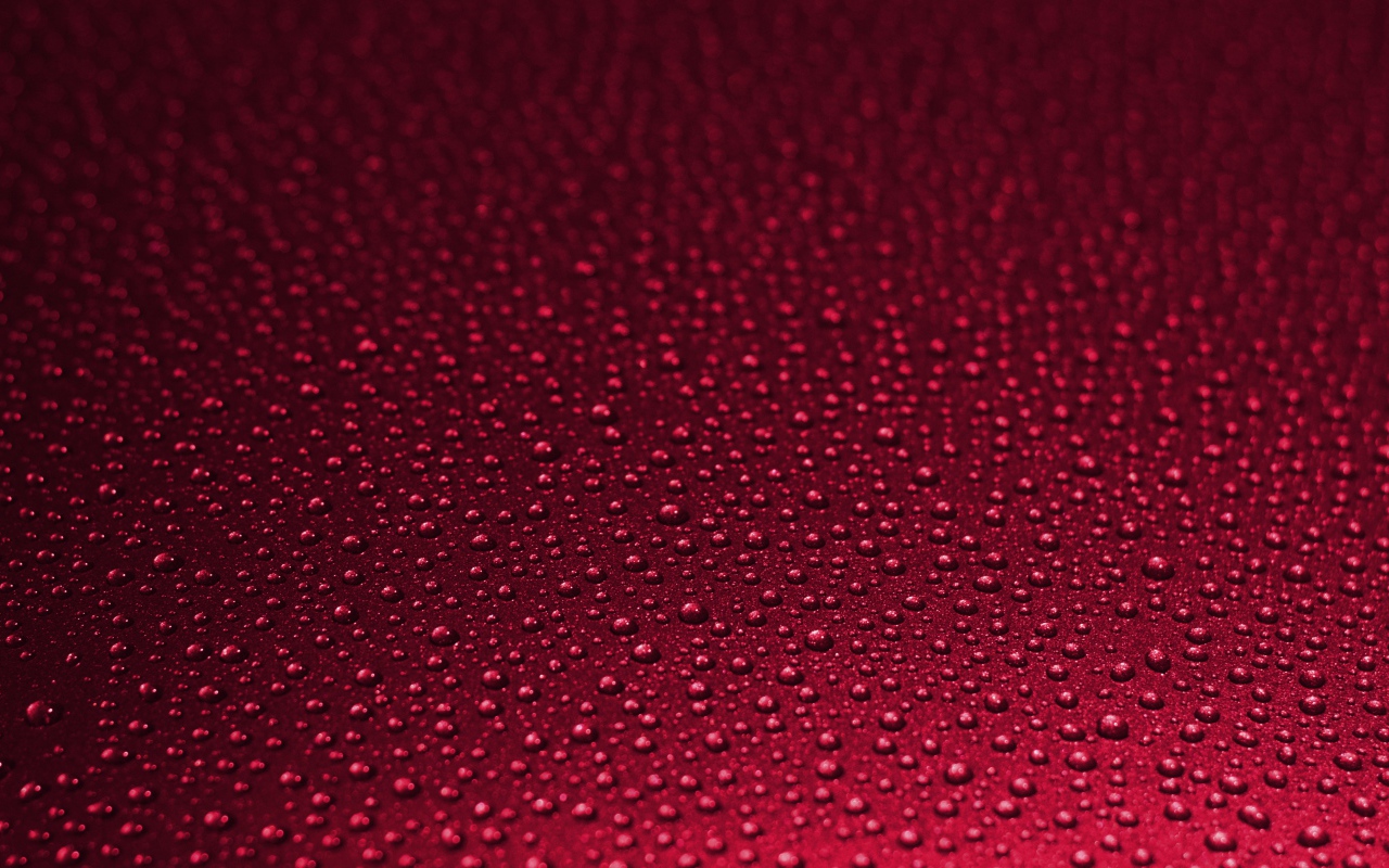 Красный фон с каплями воды 