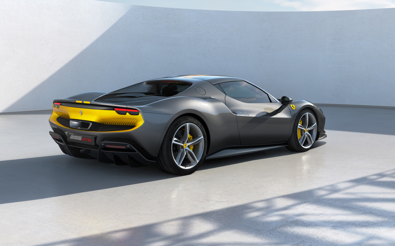 Быстрый автомобиль Ferrari 296 GTB Assetto Fiorano 2022  года вид сзади