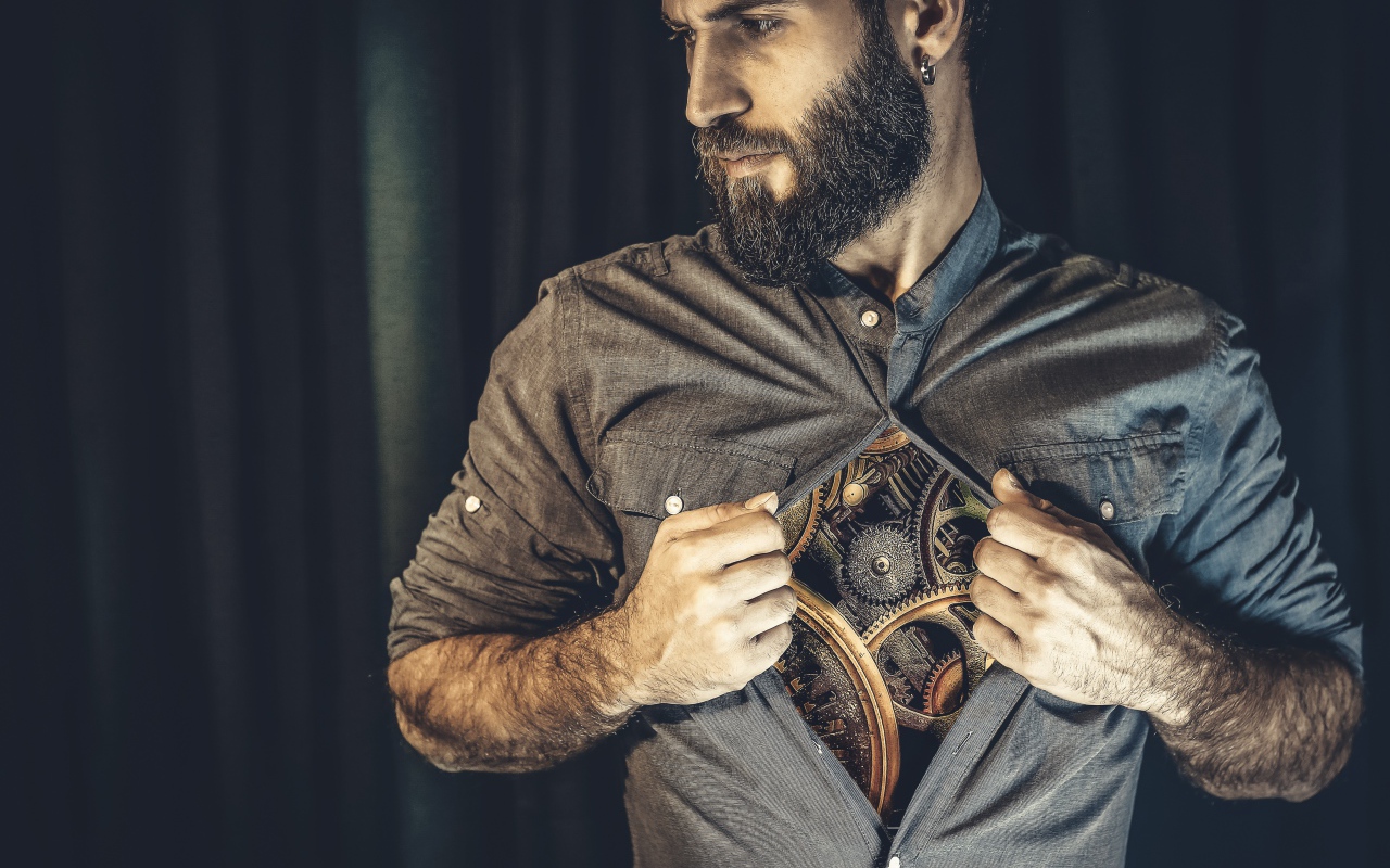 Бородатый мужчина с часовым механизмом внутри 