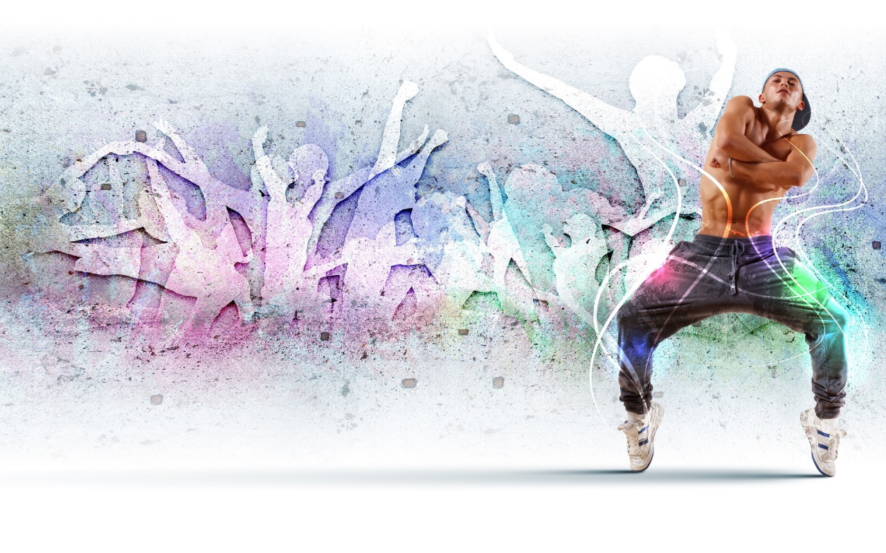 Парень танцор на фоне стены 