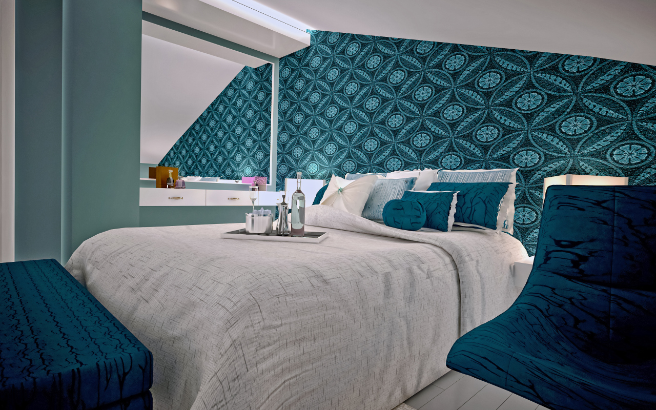 Спальня с большой серой кроватью и красивыми стенами