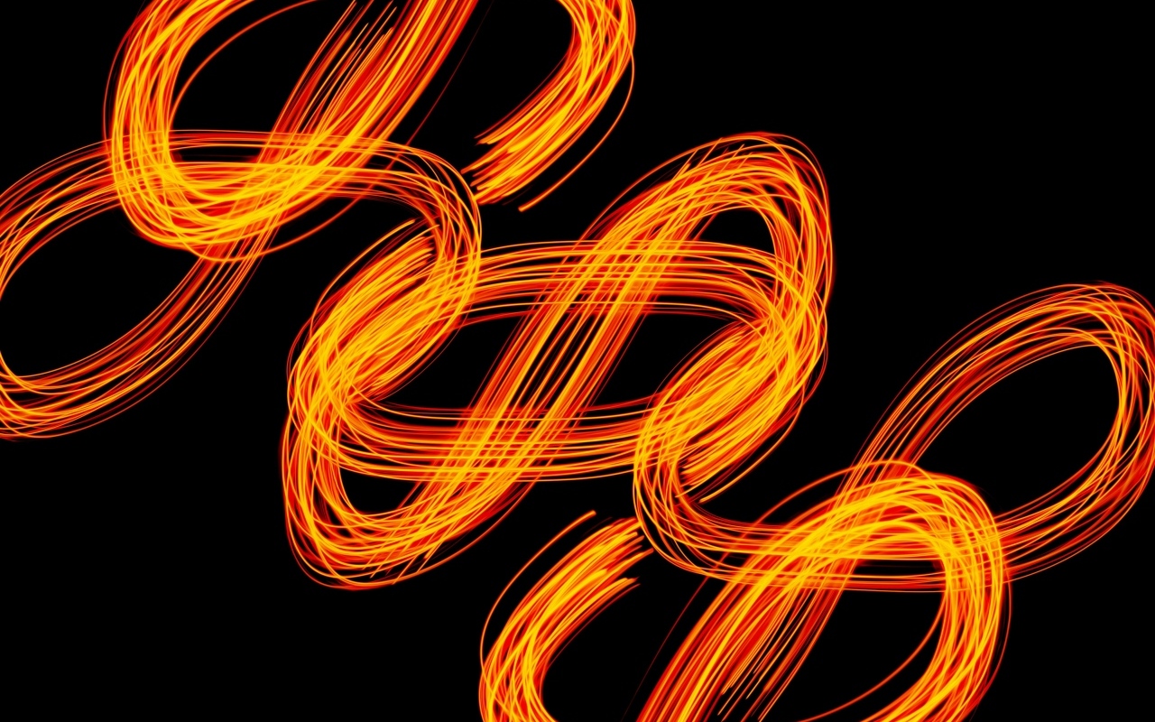 Огненные завитки на черном фоне