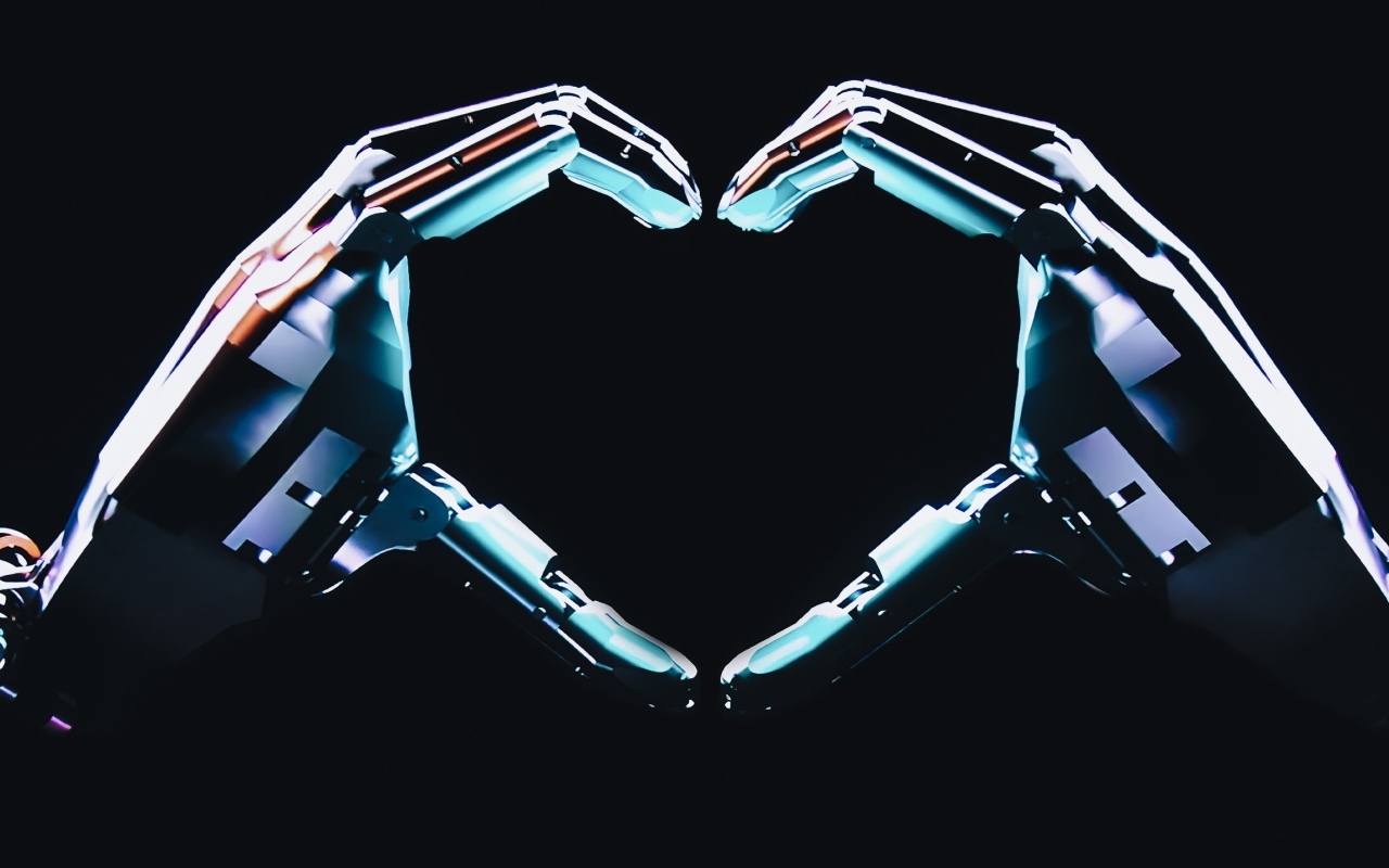 Робот делает сердце руками