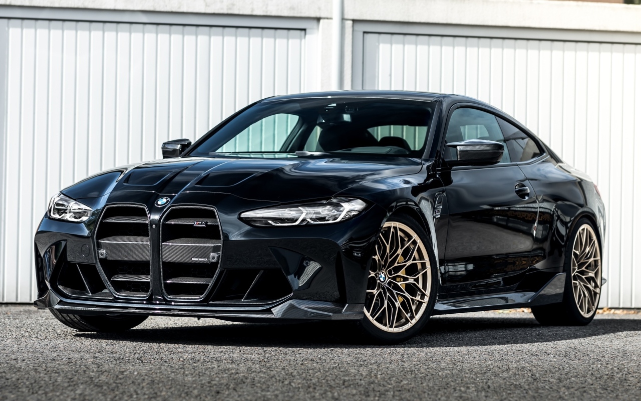 Черный автомобиль Manhart MH4 600