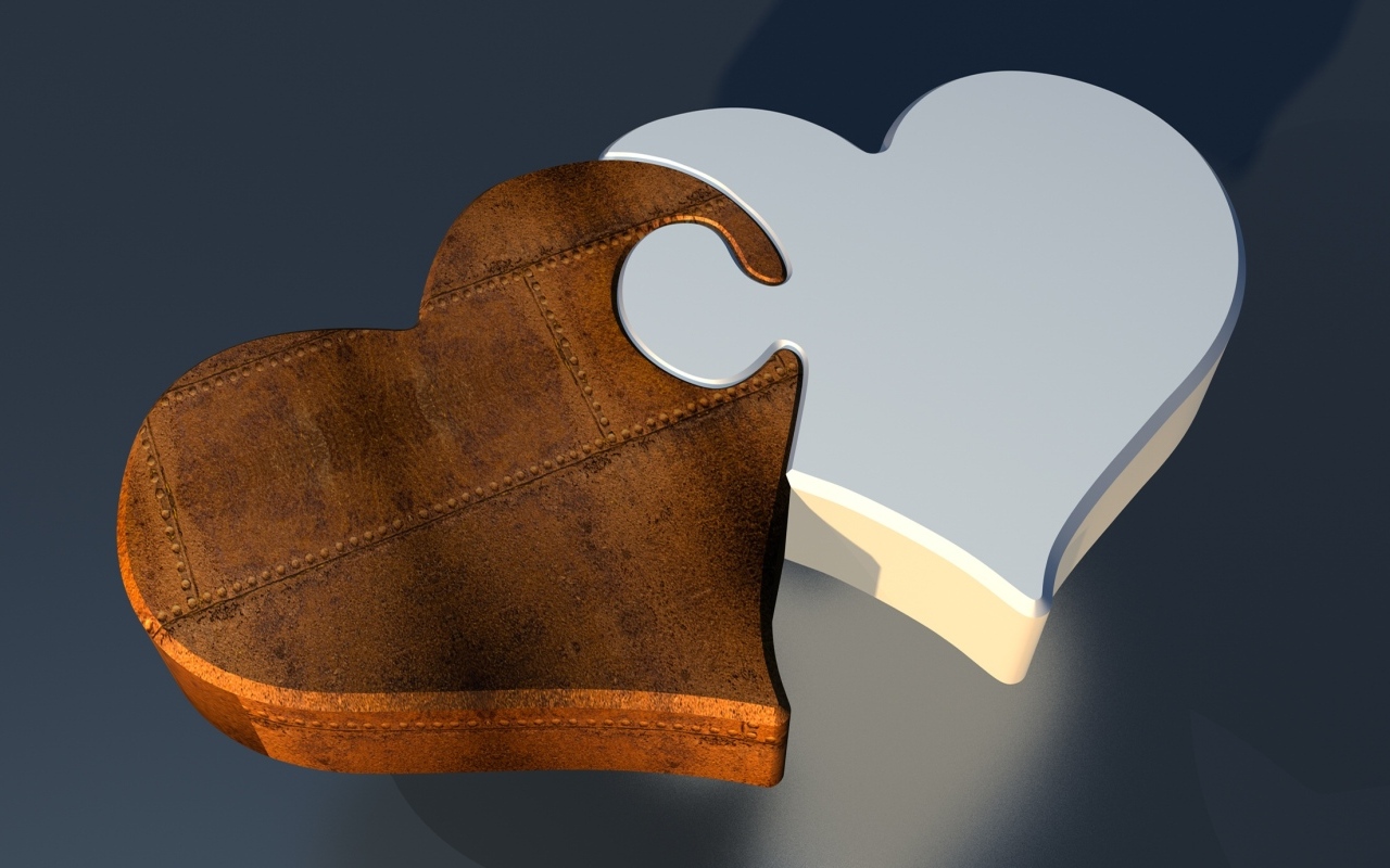 Пазл из двух сердец на сером фоне