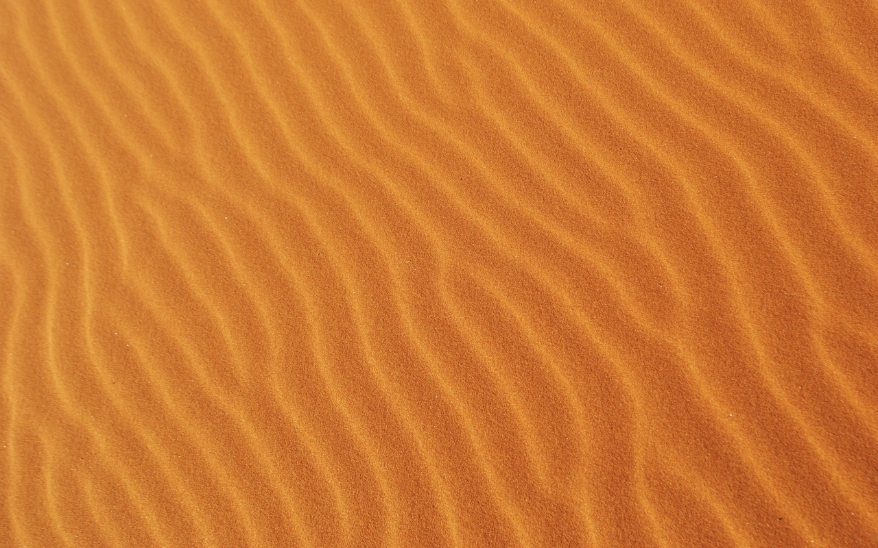 Волнистый горячий песок пустыни крупным планом