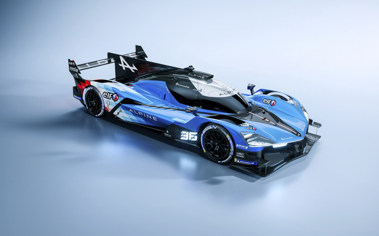 Дорогой быстрый автомобиль Alpine A424 2024 года на сером фоне