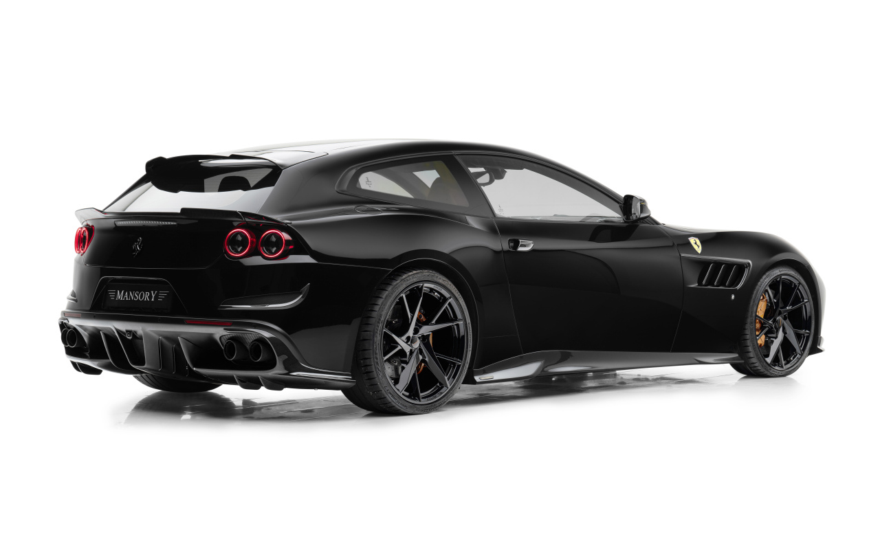 Вид сзади на черный автомобиль  Mansory Ferrari GTC4Lusso 2024 года