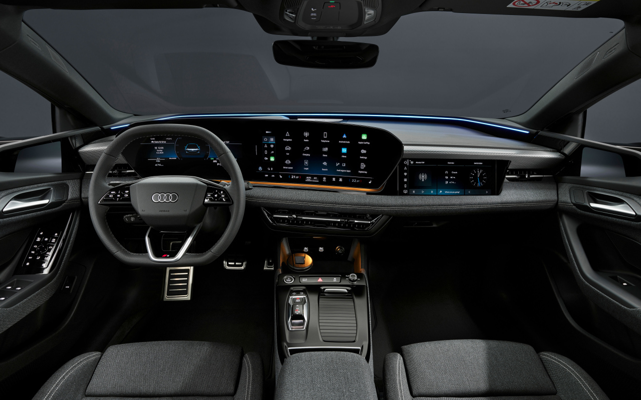 Черный салон автомобиля Audi A6 Sportback e-tron performance 2024 года