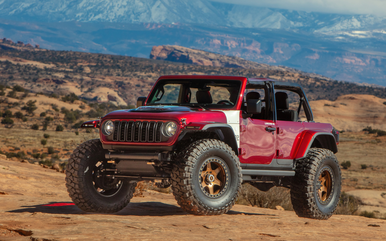 Красный внедорожник Jeep Low Down Concept 2024  года в горах