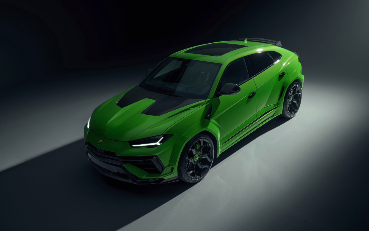Вид сверху на автомобиль Lamborghini Urus на черном фоне