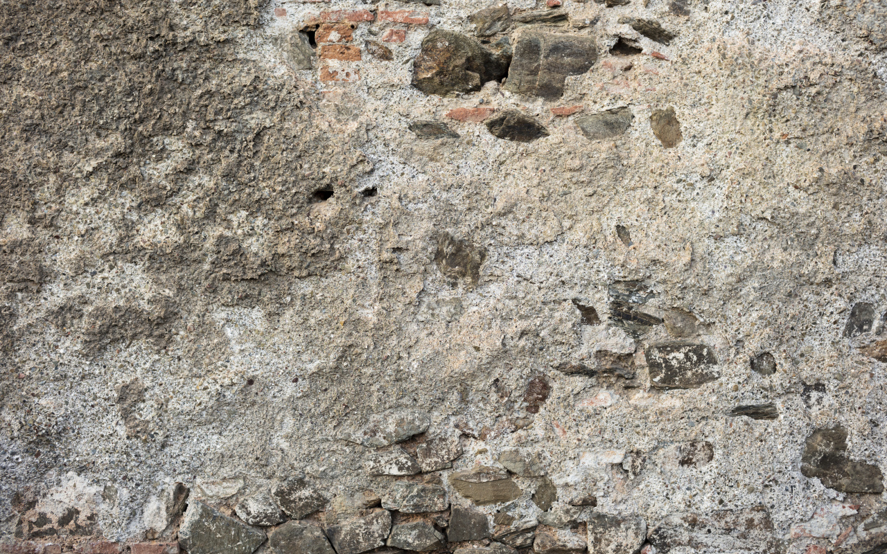 Старая текстурированная стена из цемента и кирпича для фона