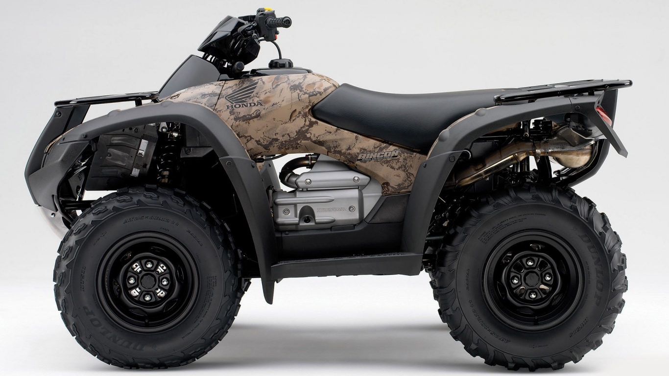 Коричневый Honda квадроцикл