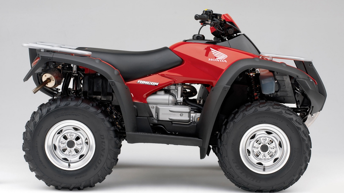 Красный Honda Rincon квадроцикл