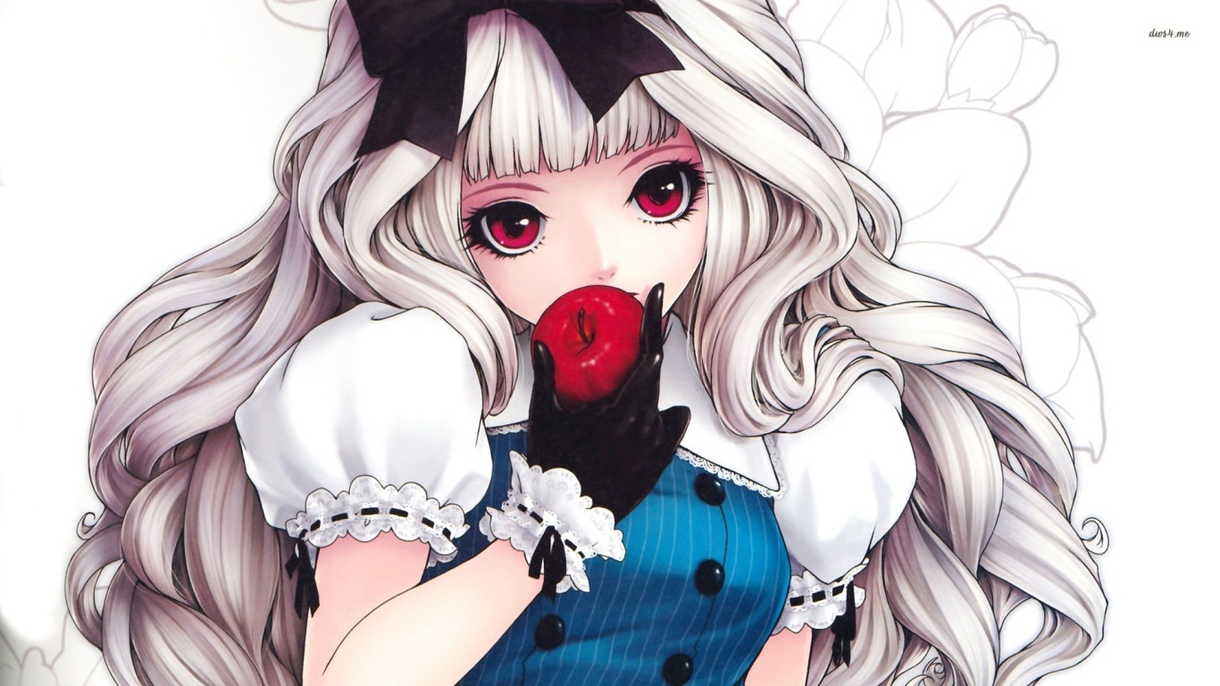 Девочка откусывает яблоко