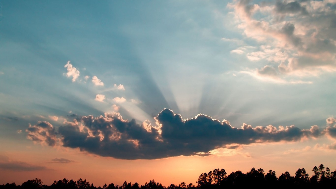 Лучи солнца из облака