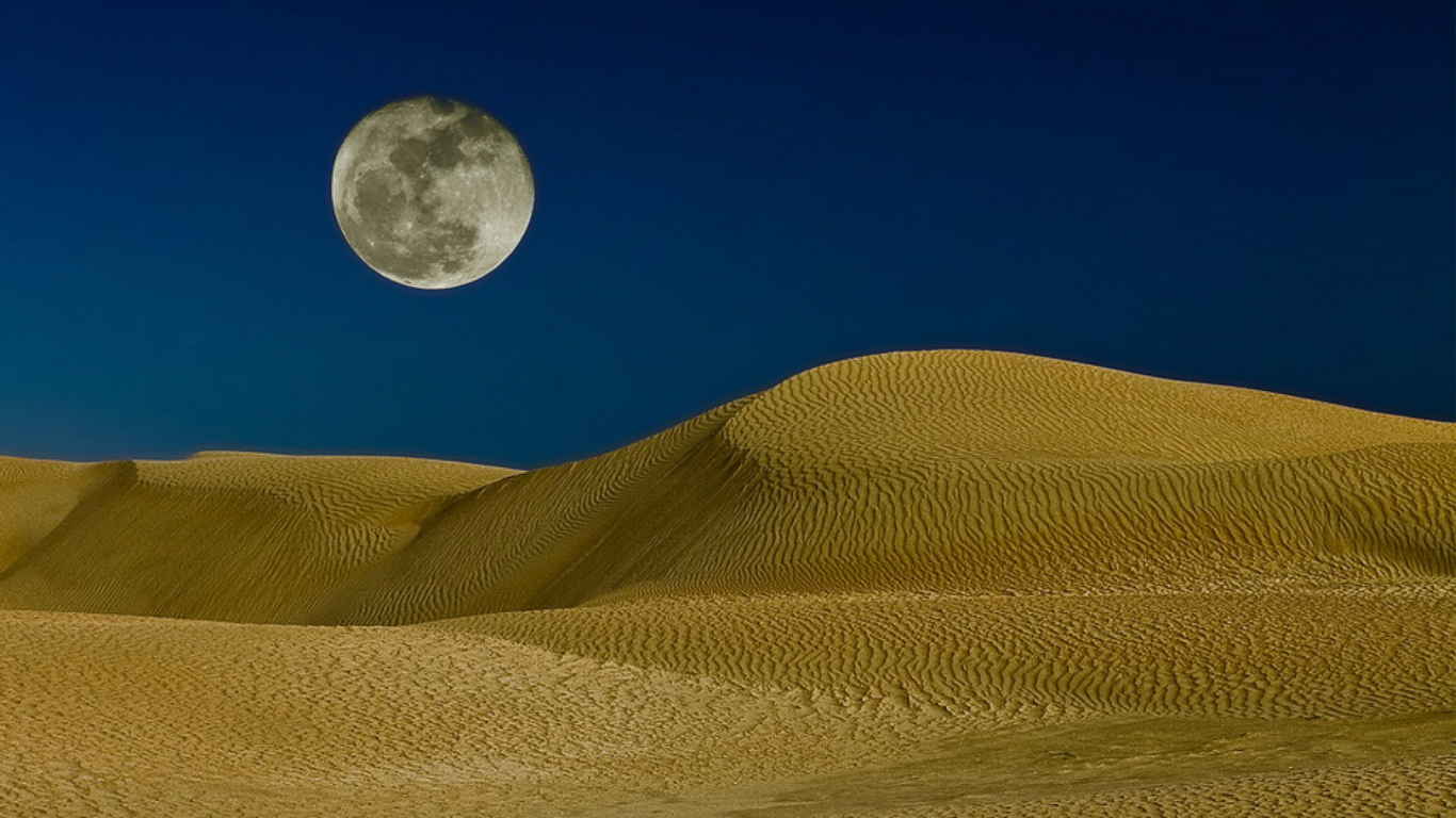 Moon over the sand dunes