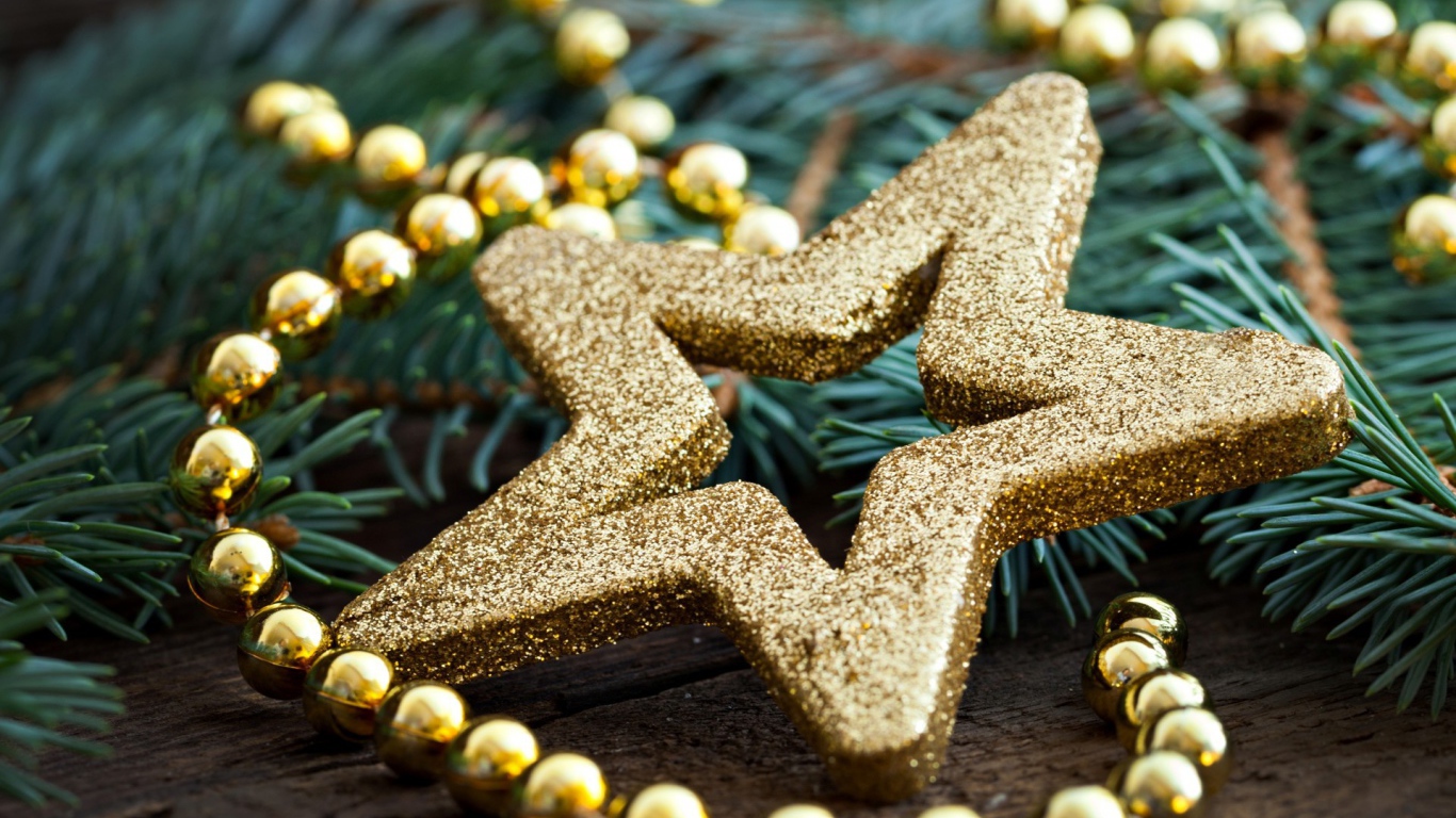 Ёлочная игрушка золотого цвета