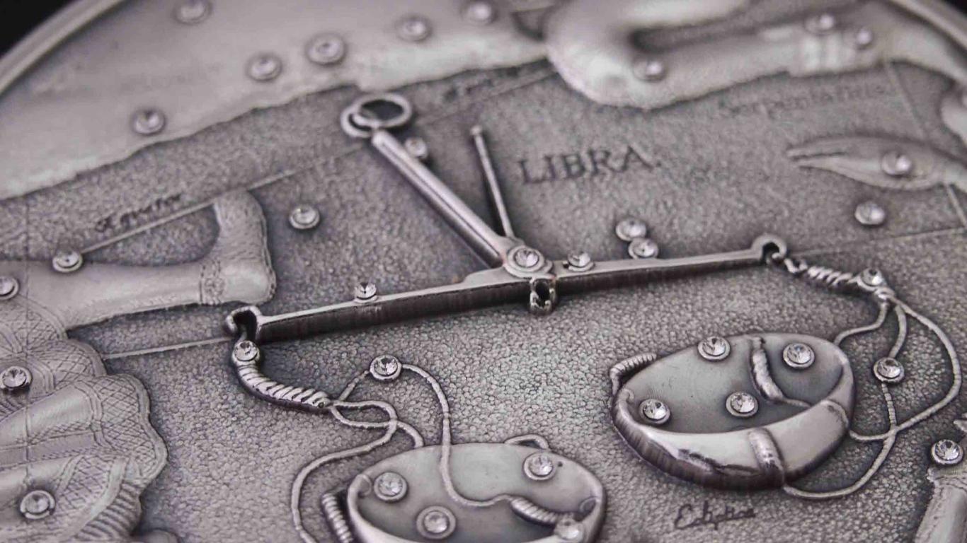 Весы на монете