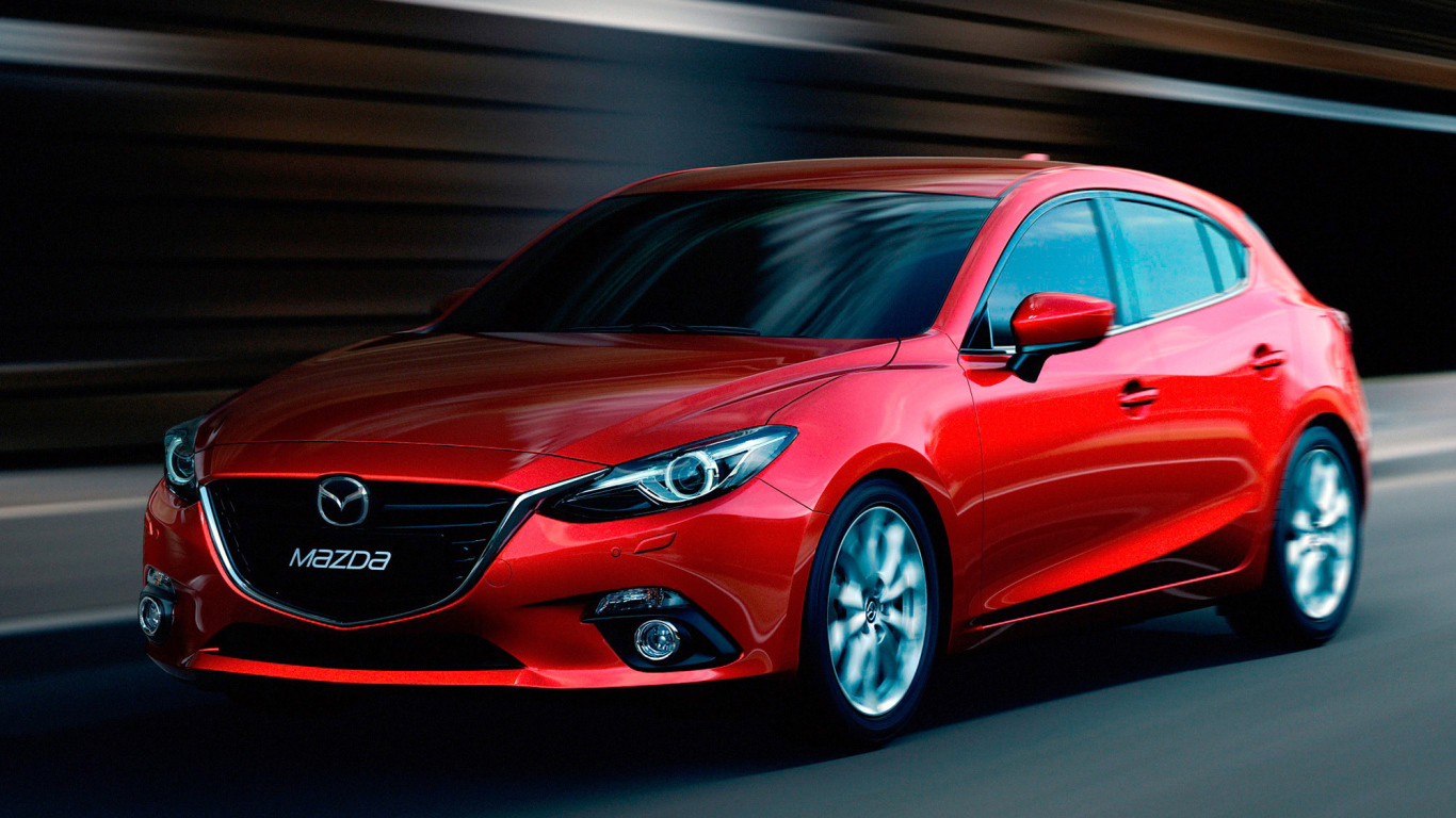 Красивый автомобиль Mazda 3 2014