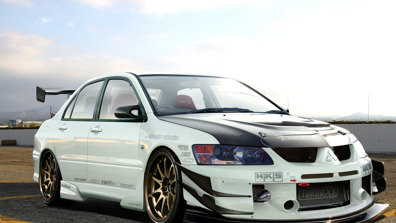 Автомобиль Mitsubishi Lancer Evolution на дороге