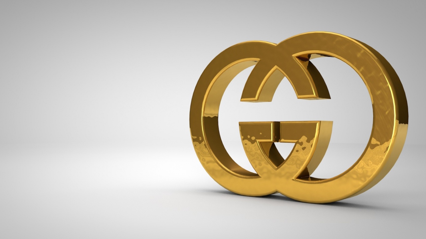 Золотой символ Gucci