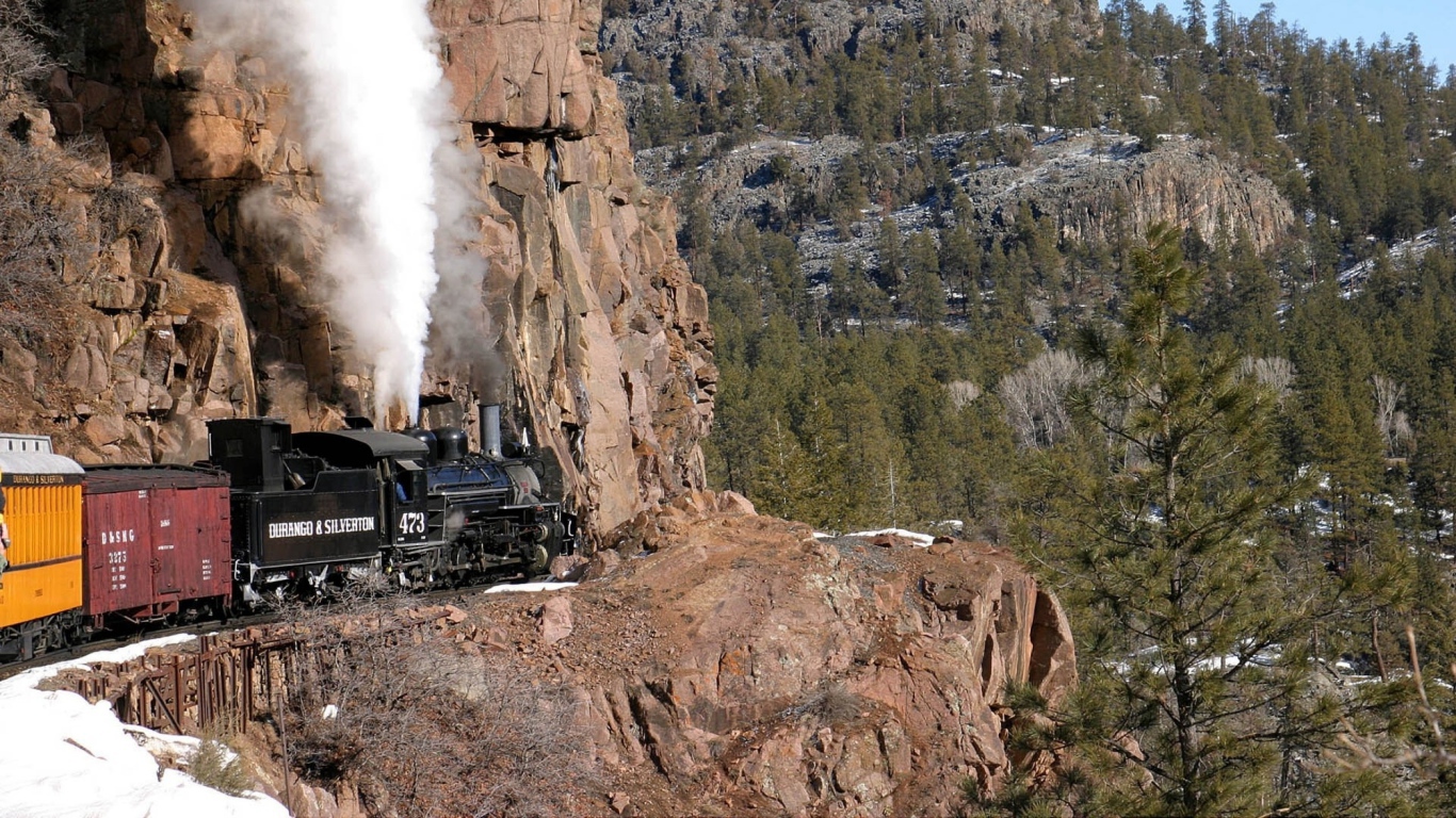 The steam locomotive in the mountains