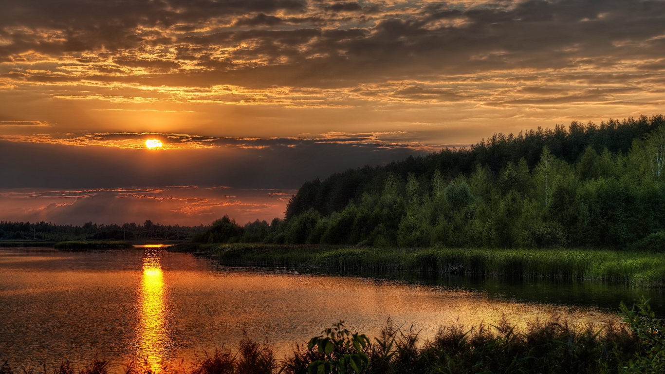 Закат солнца за тучу