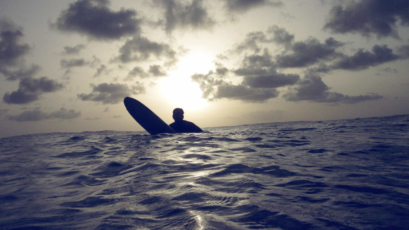 Серфер в Барбадосе