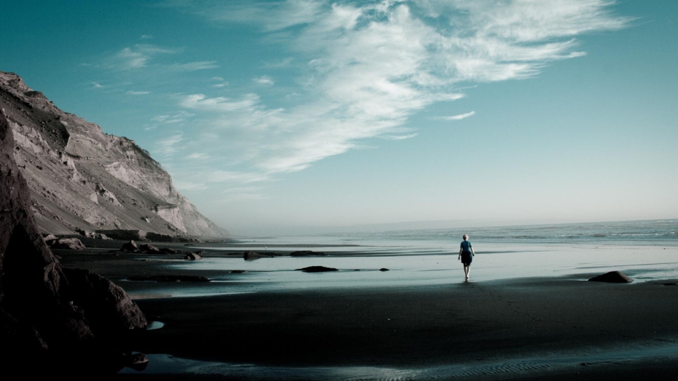 Photo of a woman on the seashore