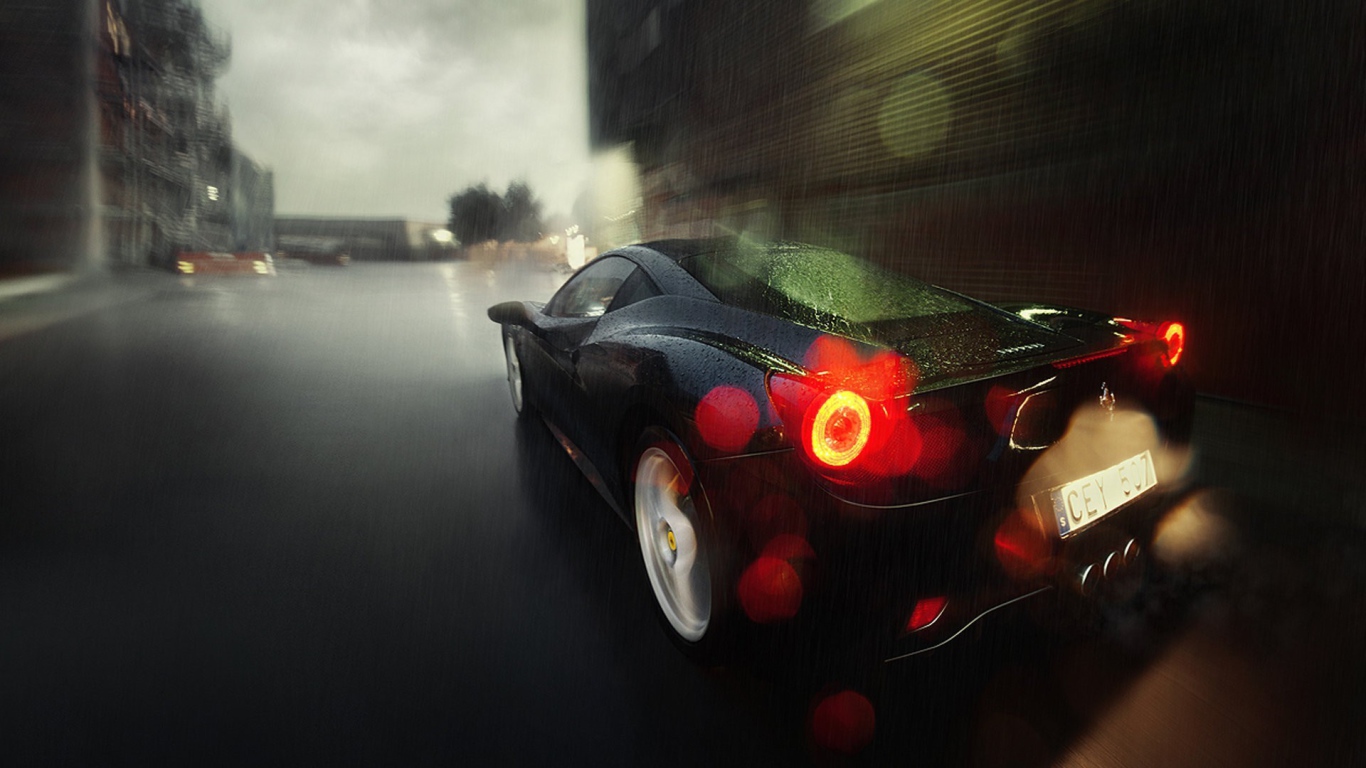Black Ferrari 458 rides in the rain