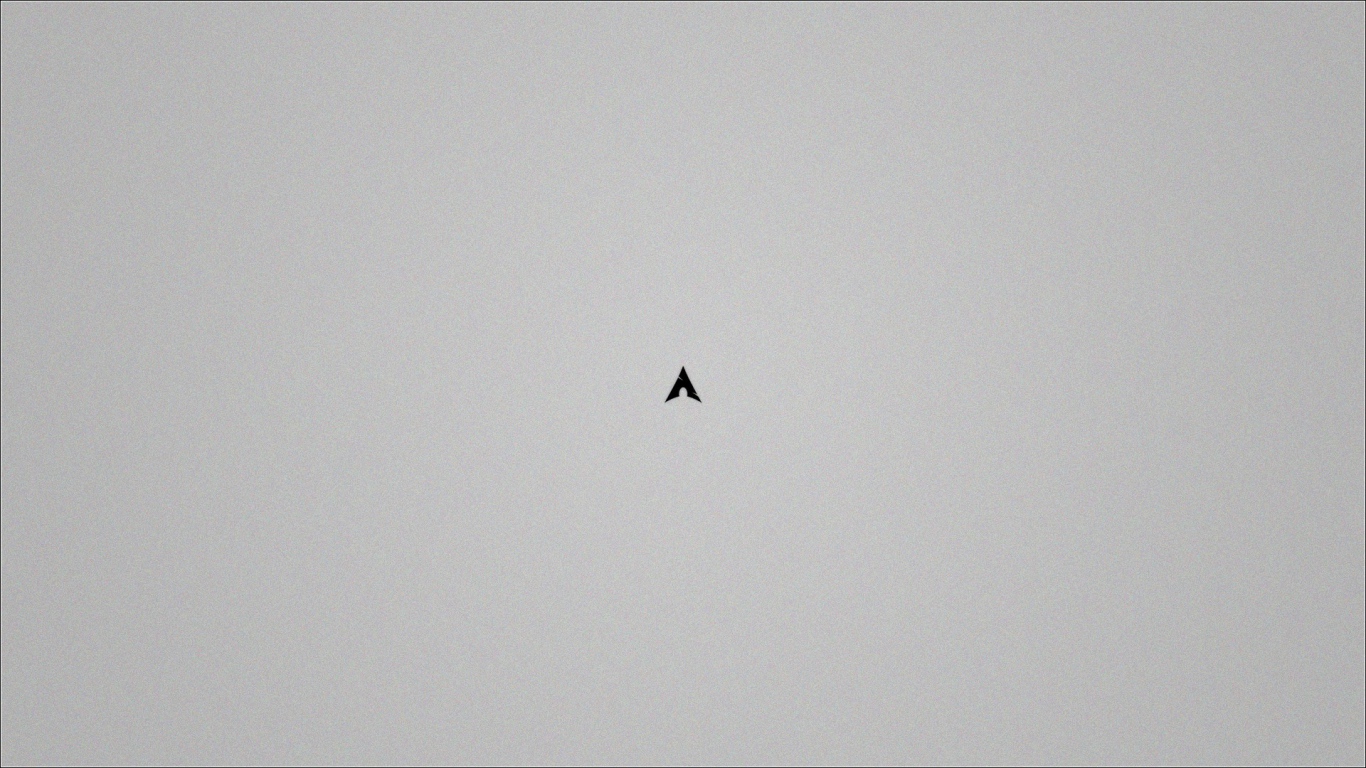 Маленький черный треугольник на сером фоне