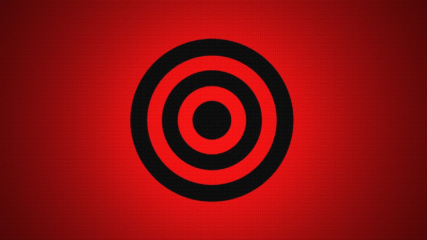 Черная мишень на красном фоне