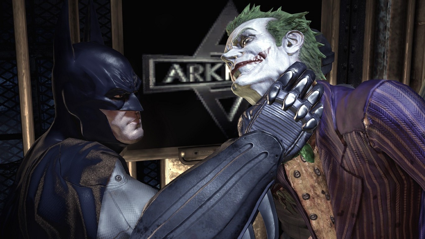 Бэтман держит Джокера за горло в игре Batman Arkham Asylum
