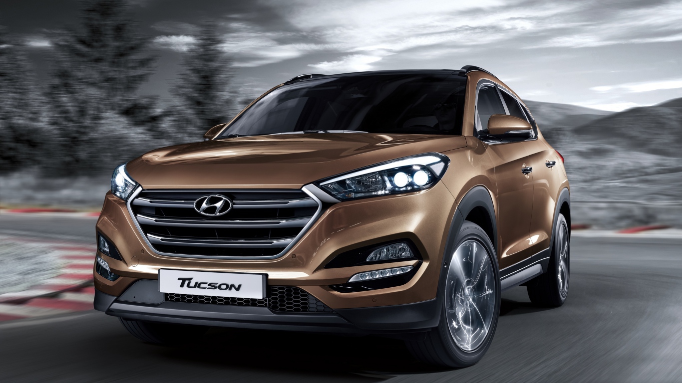 Автомобиль Hyundai Tucson коричневого цвета 