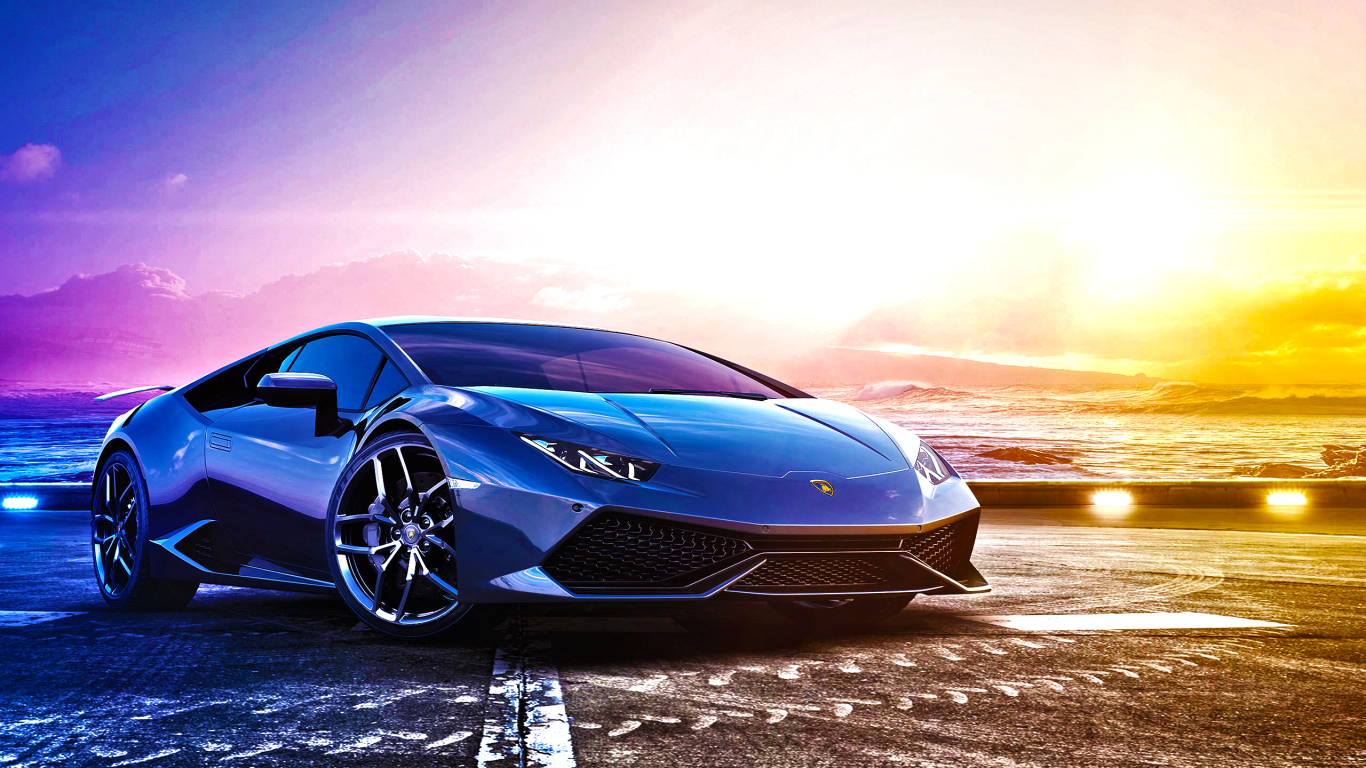 Синий спортивный автомобиль Lamborghini Huracan LP 610-4 на фоне океана 