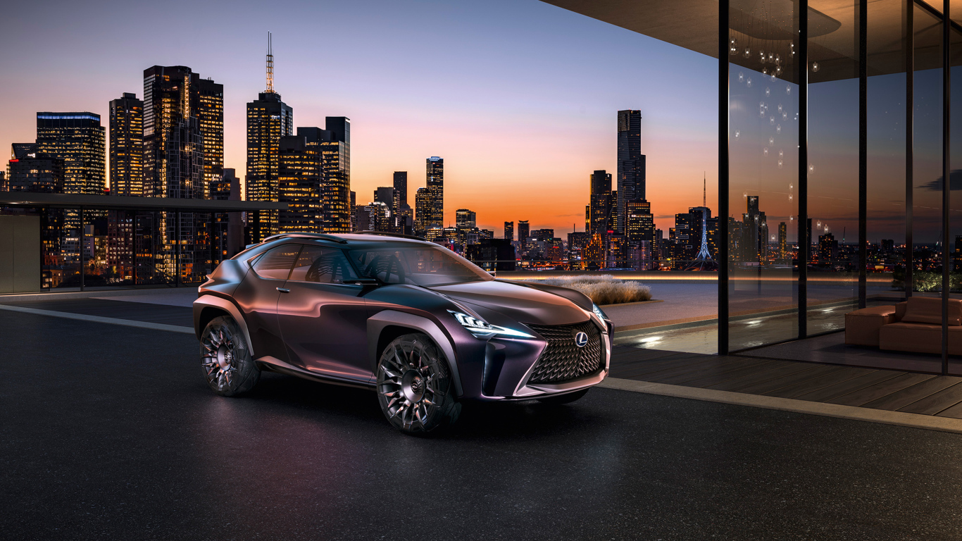 Стильный кроссовер Lexus UX на фоне ночного города