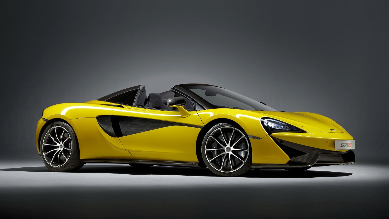 Стильный спортивный автомобиль McLaren 570S желтого цвета