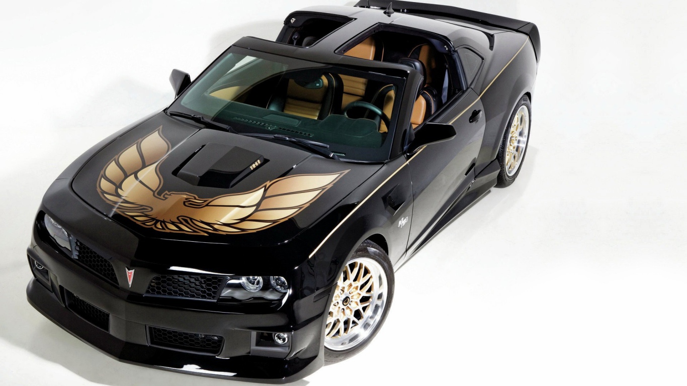 Черный спортивный автомобиль Pontiac Firebird на белом фоне 