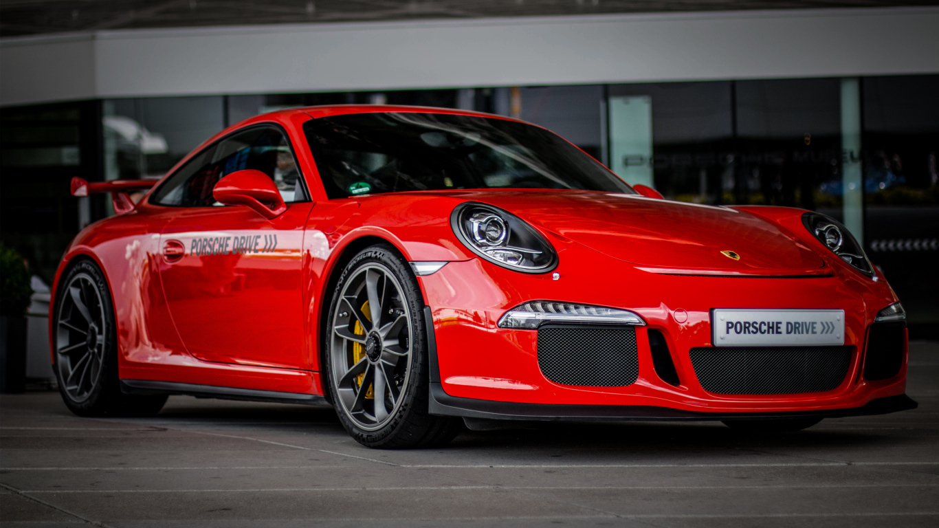 Красный спортивный автомобиль Porsche Drive Supercar