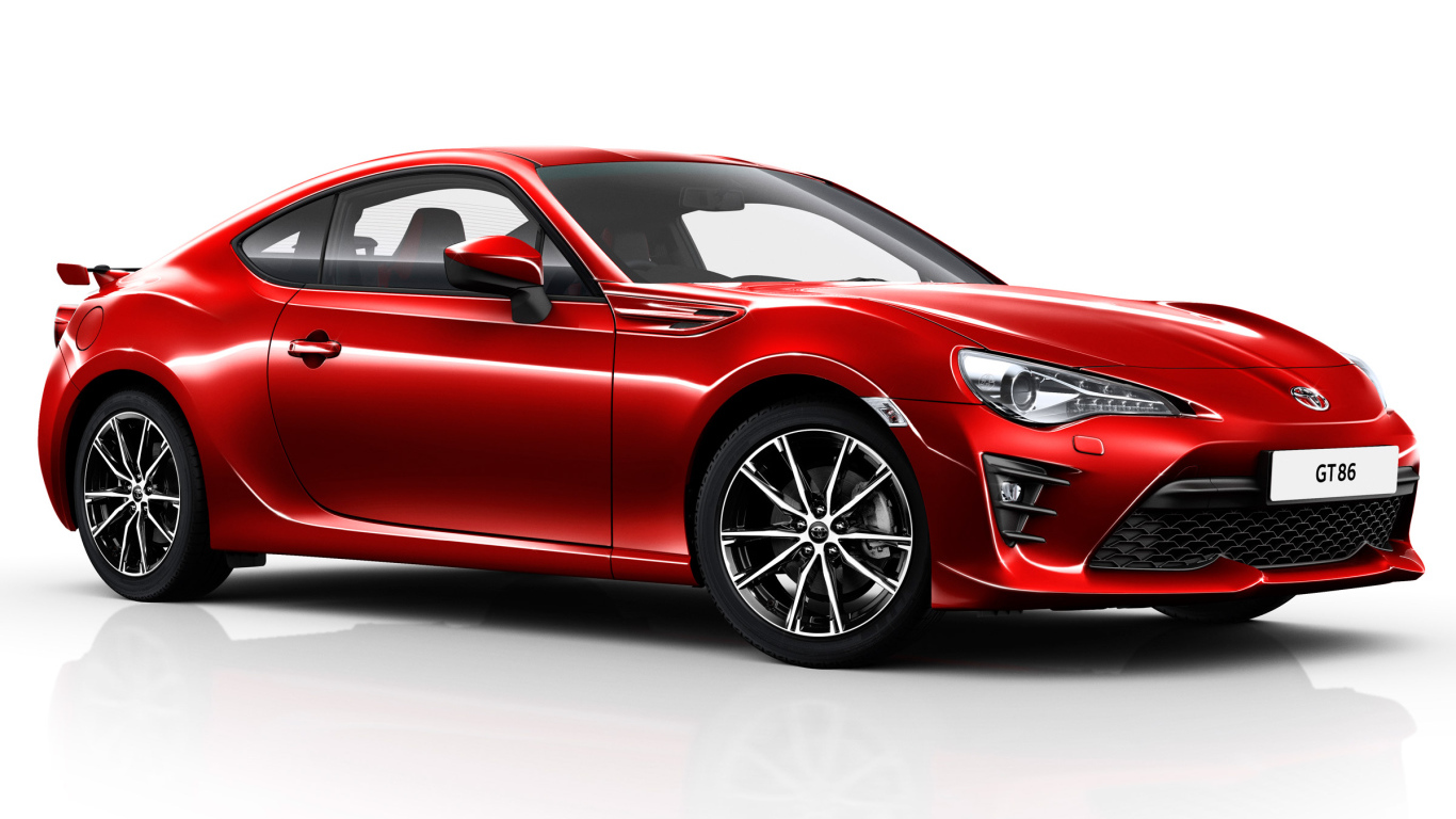 Красная Toyota GT86  2017 года на белом фоне 
