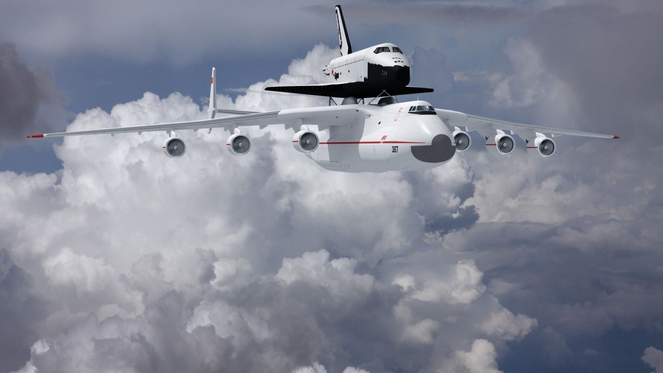 Самолет Ан- 225 Мрия  и ракета носитель «Буран» в на фоне белых облаков 